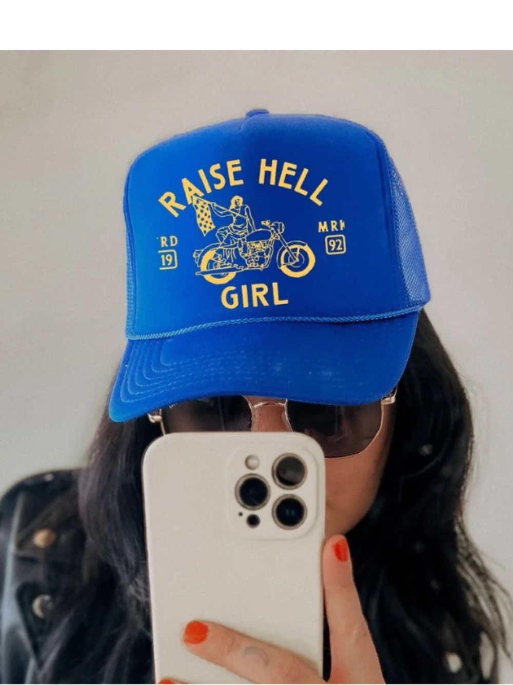 RawRebellious Blue Trucker Hat with Yellow “Raise Hell Girl” graphic